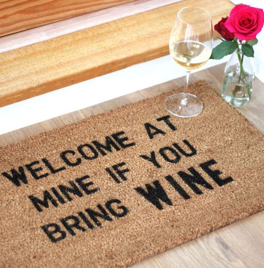 ‘Welcome at mine if you bring WINE’ Doormat